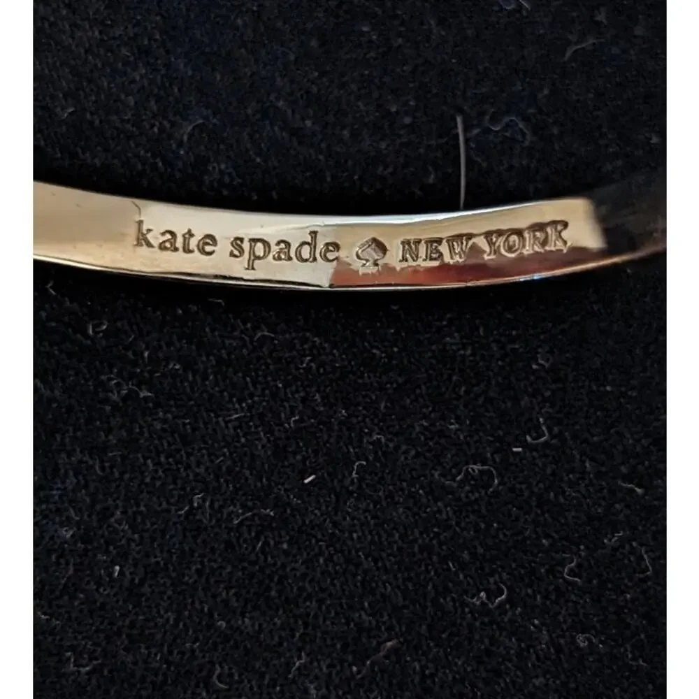 Kate Spade New York White Enamel Gold Tone Hinge Bangle Bracelet - Picture 4 of 5